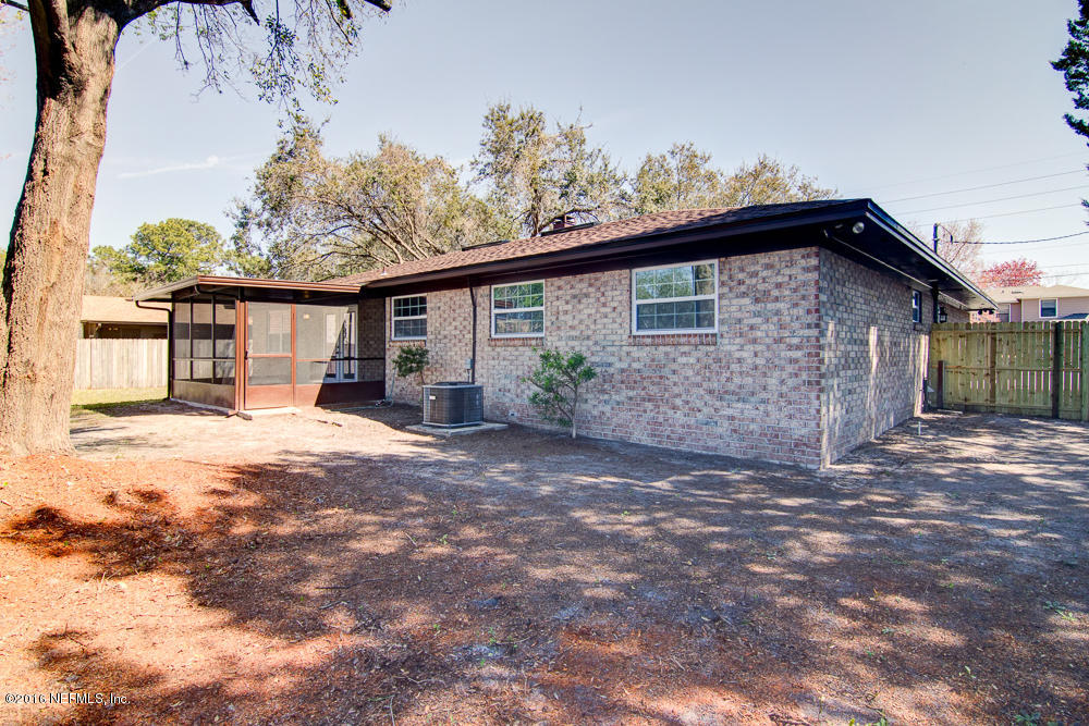 1634 Derringer Road Jacksonville, FL 32225 - Photo 39 of 41 a view of a house with a yard