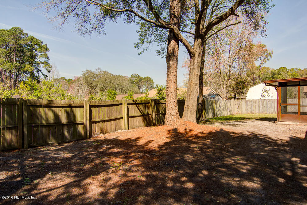 1634 Derringer Road Jacksonville, FL 32225 - Photo 40 of 41 a view of a backyard of the house
