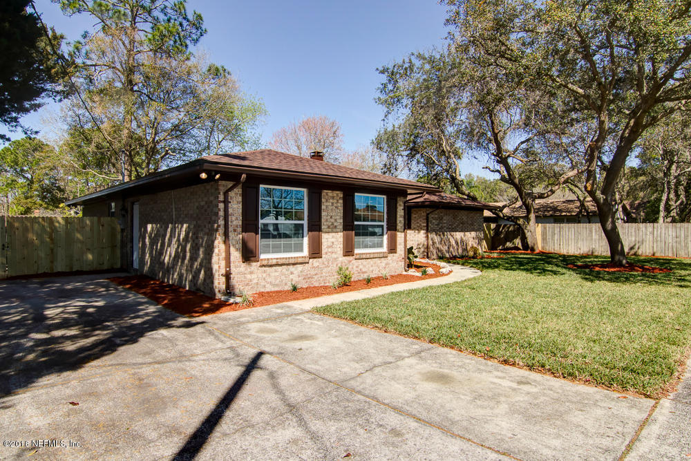 1634 Derringer Road Jacksonville, FL 32225 - Photo 41 of 41 a view of a house with backyard and sitting area