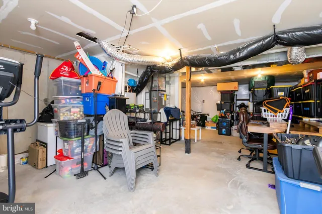 a view of gym equipment and living room