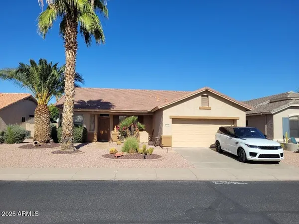 a car parked in front of a house