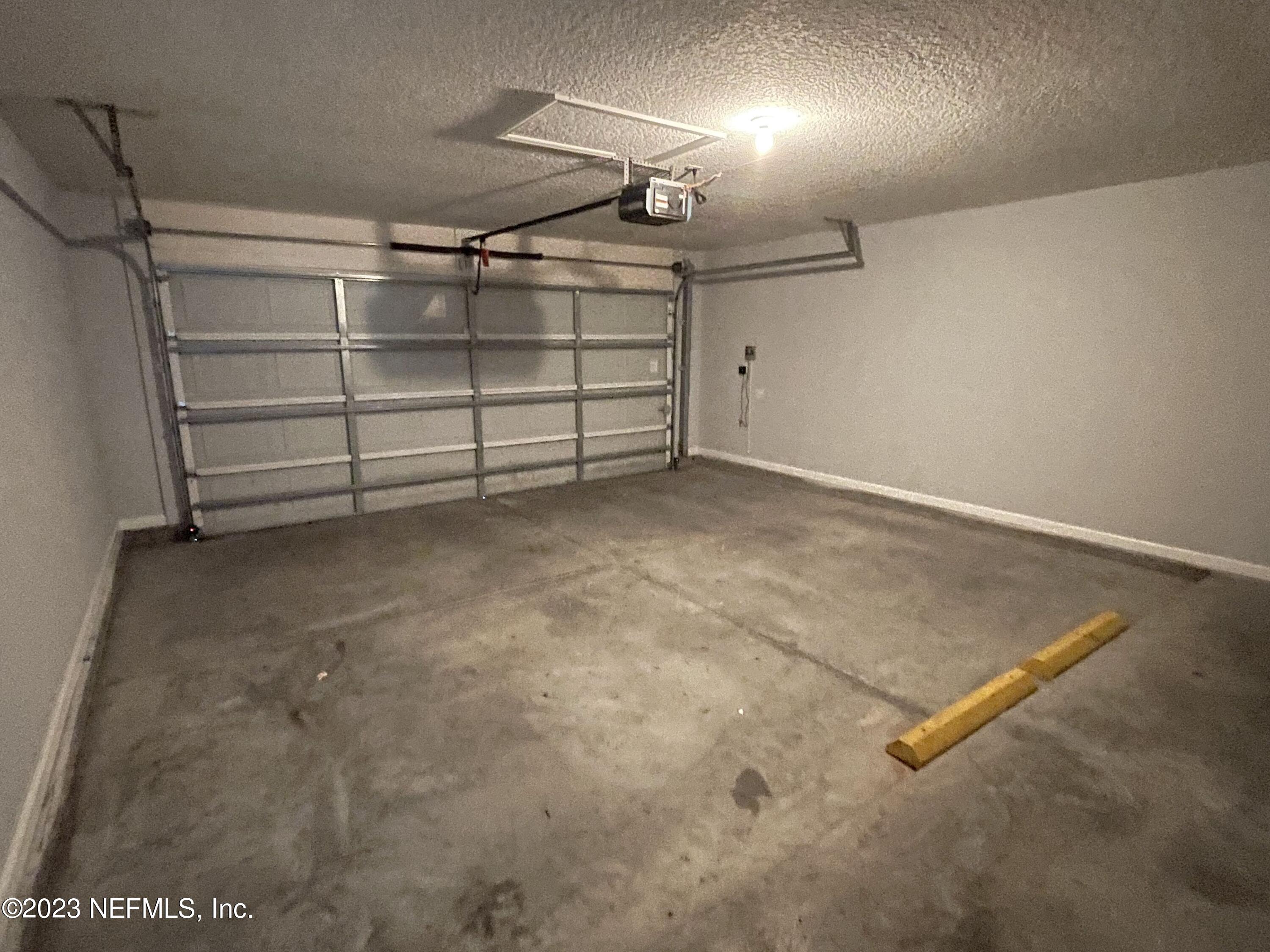 86050 Sands Way Yulee, FL 32097 - Photo 14 of 15 a view of a room with storage