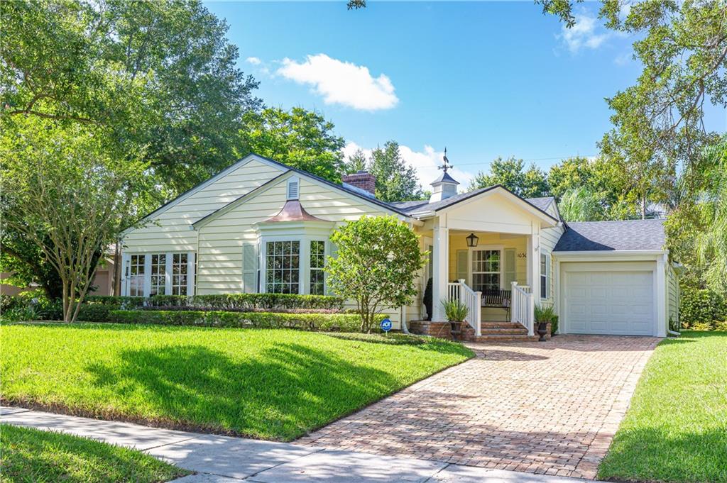 1030 Nottingham Street Orlando, FL 32803 - Photo 1 of 1 a front view of house with yard and green space