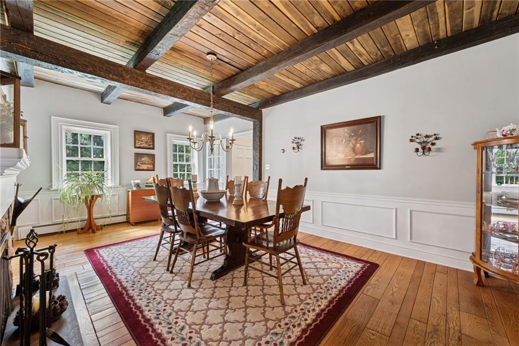 513 Austraw Road Ligonier, PA 15658 - Photo 11 of 50 a view of a dining room with furniture window and wooden floor
