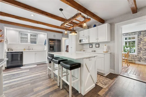 a kitchen that has a cabinets and a stove