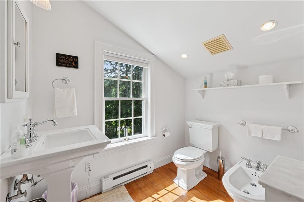 513 Austraw Road Ligonier, PA 15658 - Photo 30 of 50 a bathroom with a toilet sink and mirror
