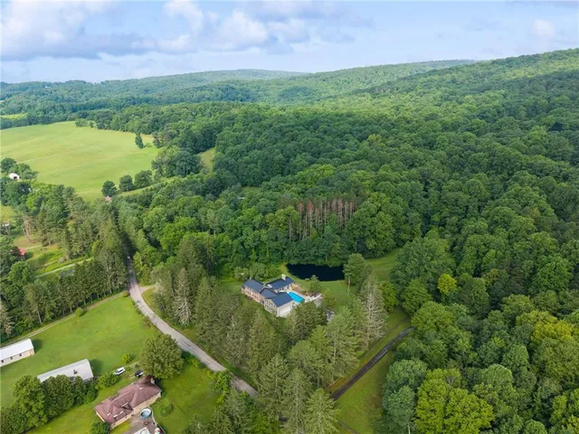 a view of a lake with a yard