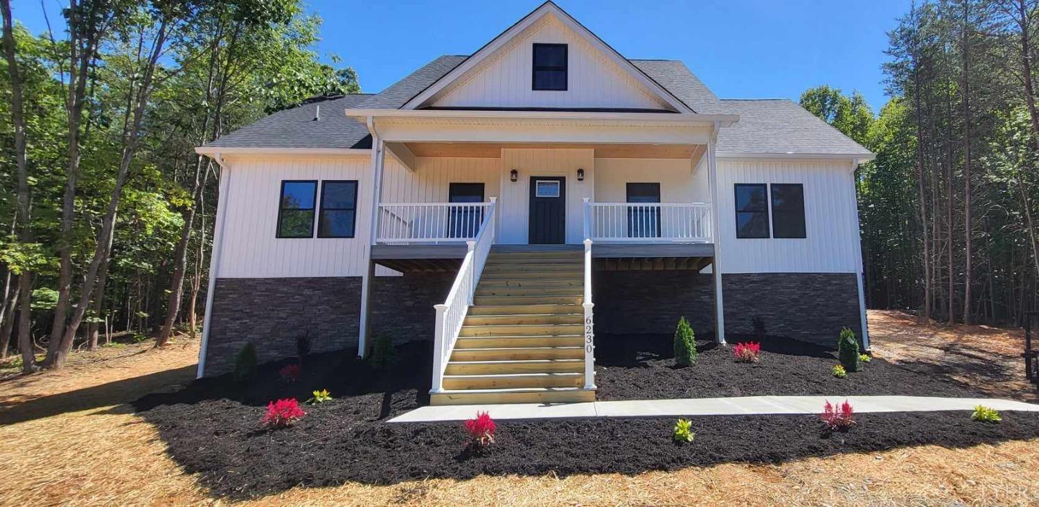 6230 Charlemont Road Goode, VA 24556 - Photo 2 of 99 a front view of a house with a yard