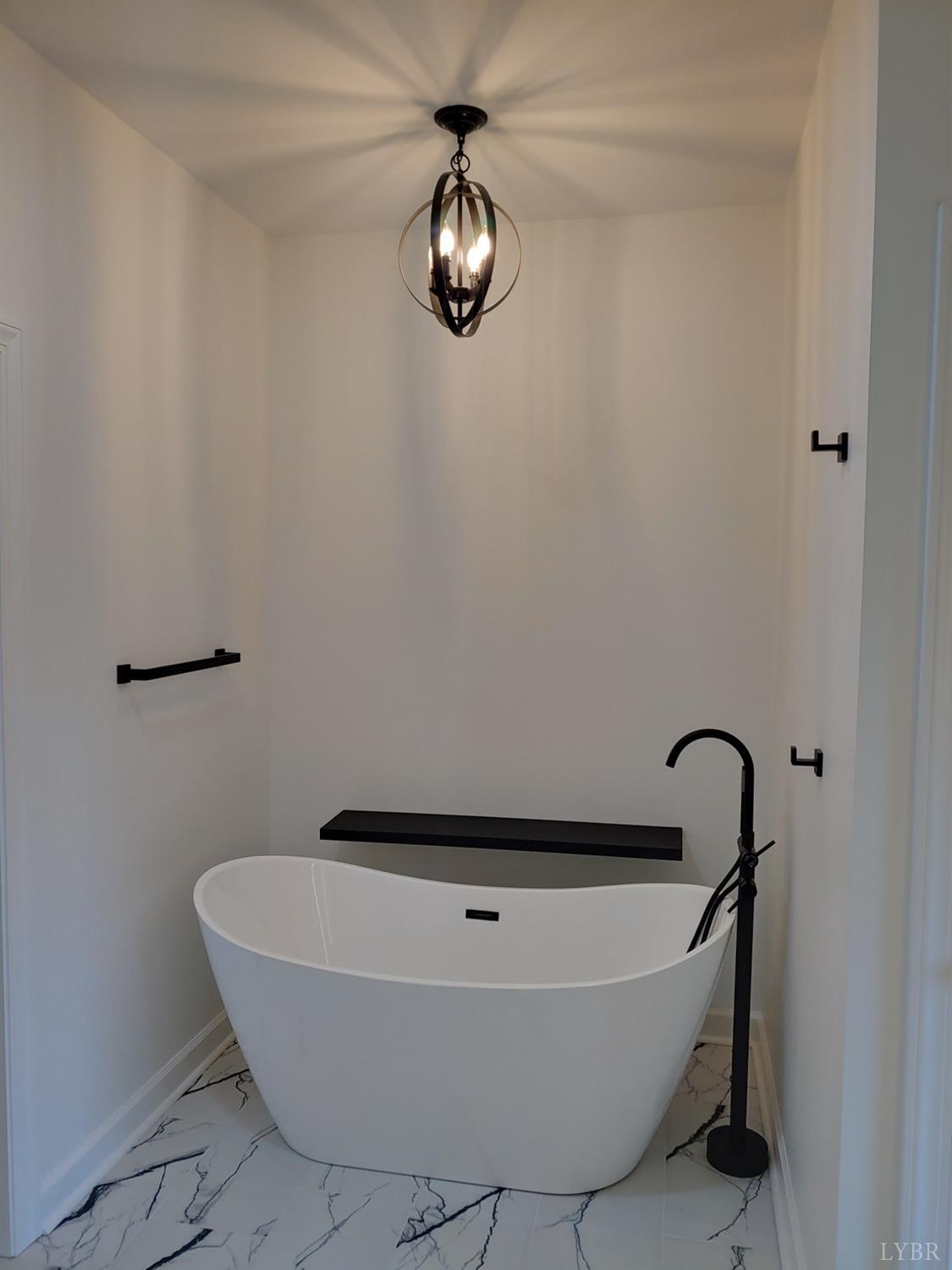 6230 Charlemont Road Goode, VA 24556 - Photo 44 of 99 a bathroom with a bathtub