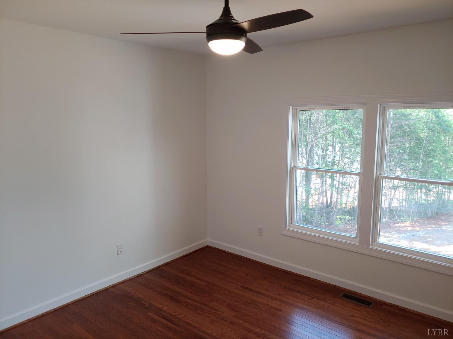 6230 Charlemont Road Goode, VA 24556 - Photo 73 of 99 wooden floor in an empty room with a window