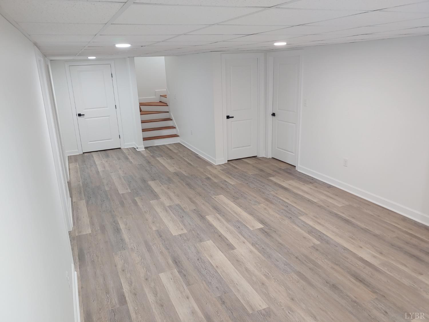 6230 Charlemont Road Goode, VA 24556 - Photo 93 of 99 a view of a room with wooden floors and stairs