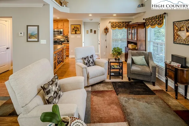 a living room with furniture and a couch