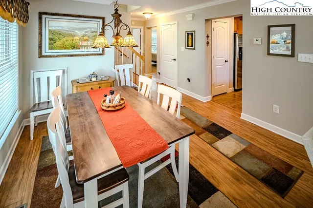 a view of a dining room with furniture