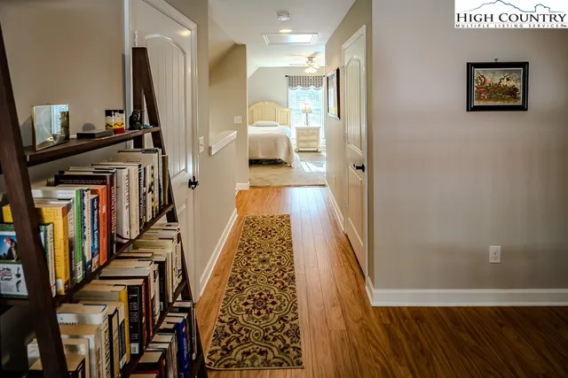 a view of a hallway with a couch