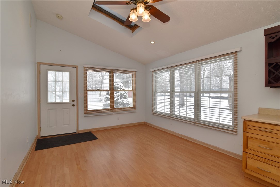 6308 Highland Road Cleveland, OH 44143 - Photo 20 of 40 Foyer with lofted ceiling, baseboards, and light wood finished floors