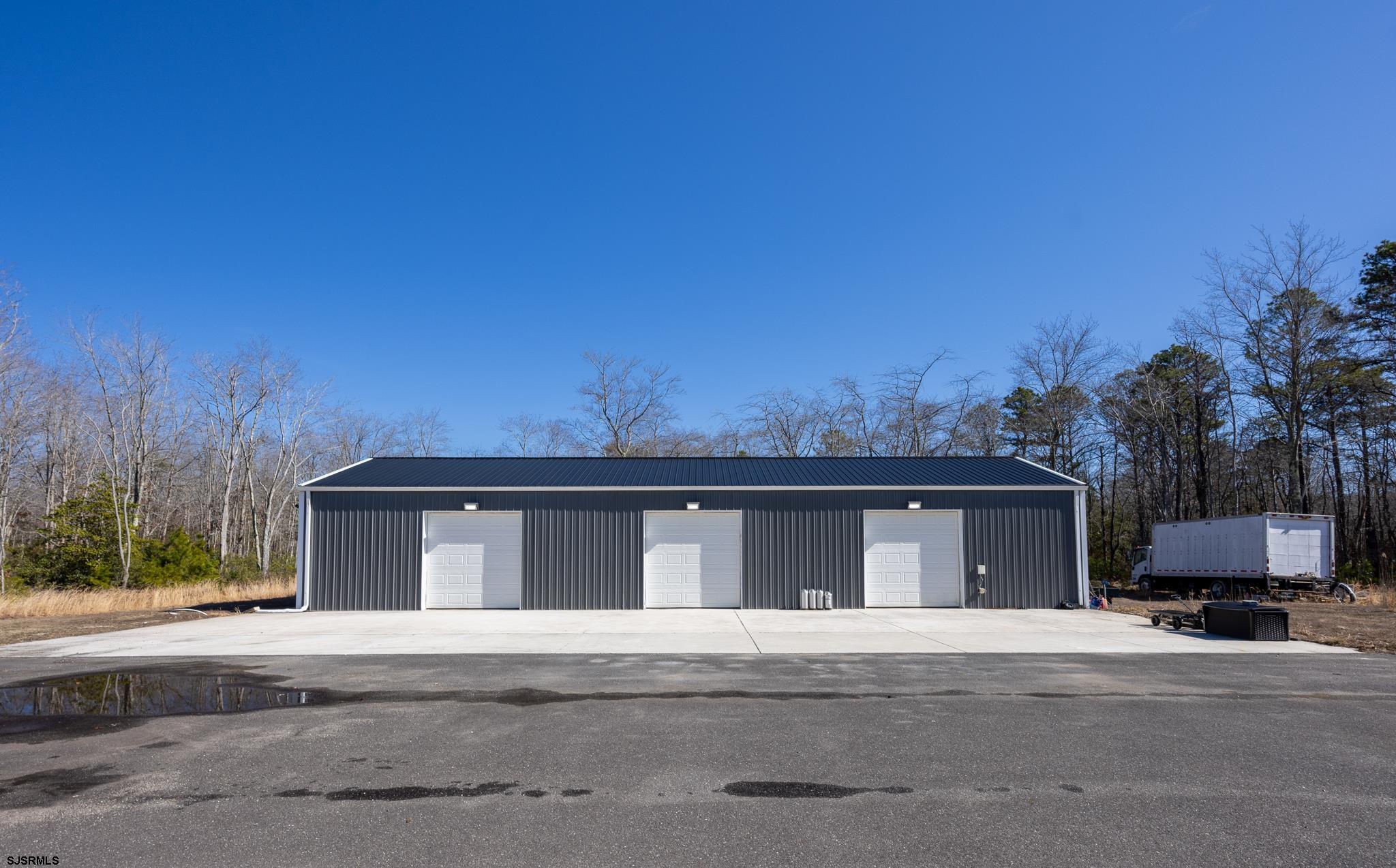 1309 Tyler Road Woodbine, NJ 08270 - Photo 73 of 84 front view of a house with a street