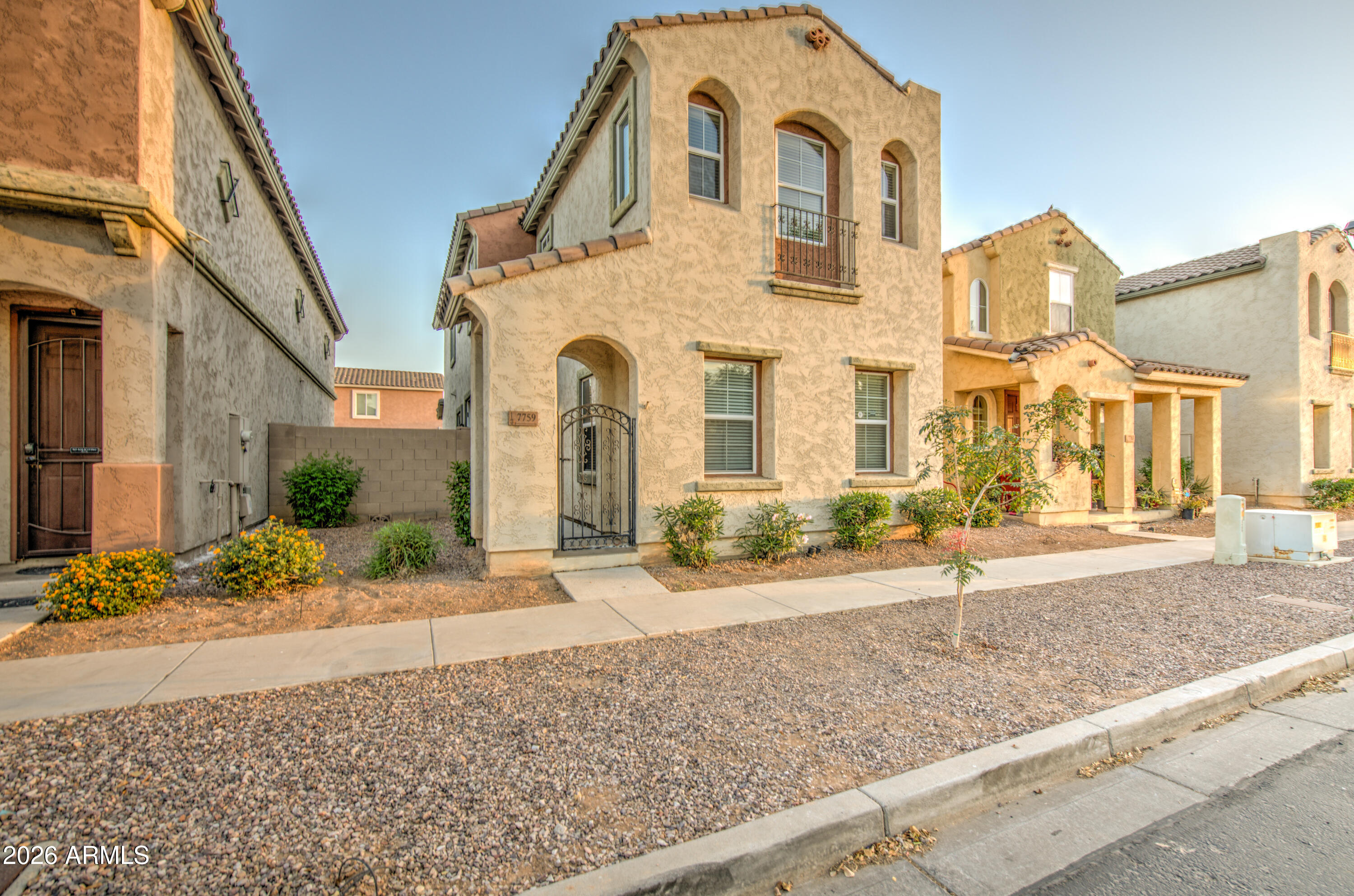 7759 West Monte Vista Road Phoenix, AZ 85035 - Photo 1 of 43 a front view of a house with garden