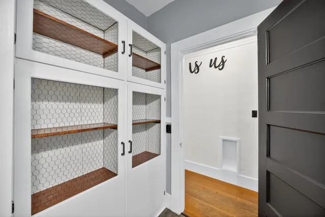 a view of a field with an ocean