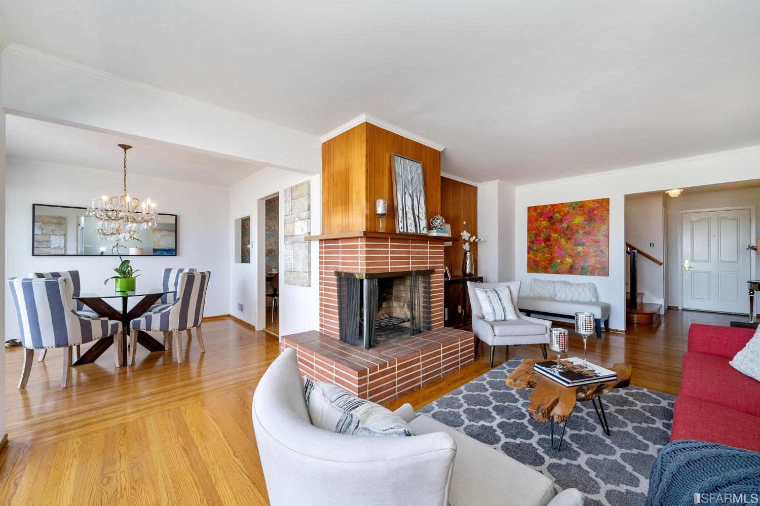 385 Corbett Avenue San Francisco, CA 94114 - Photo 13 of 72 a living room with furniture and a fireplace