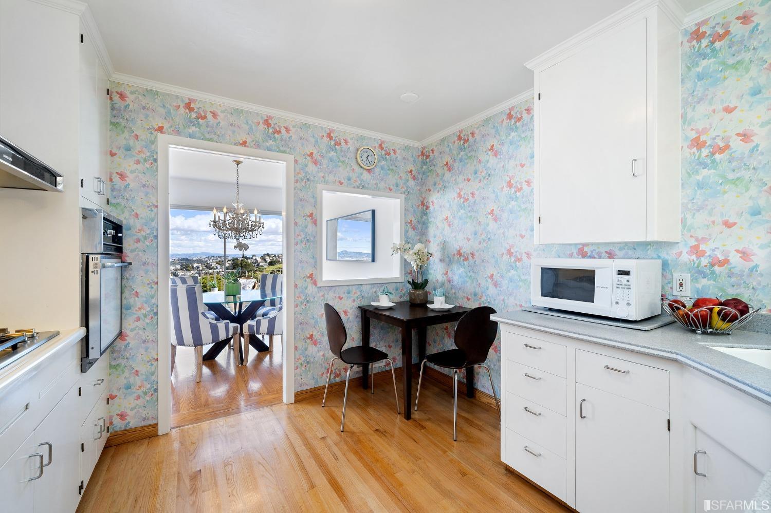 385 Corbett Avenue San Francisco, CA 94114 - Photo 29 of 72 a living room with furniture a fireplace and a flat screen tv