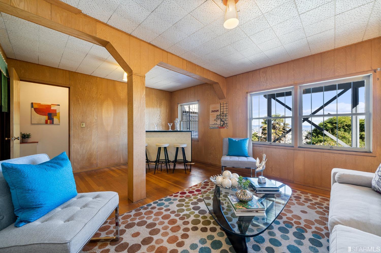 385 Corbett Avenue San Francisco, CA 94114 - Photo 48 of 72 a living room with furniture and a large window
