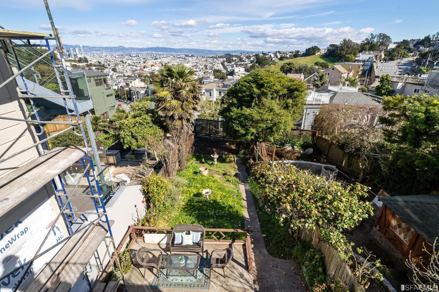 385 Corbett Avenue San Francisco, CA 94114 - Photo 54 of 72 a view of a yard with plants and large trees