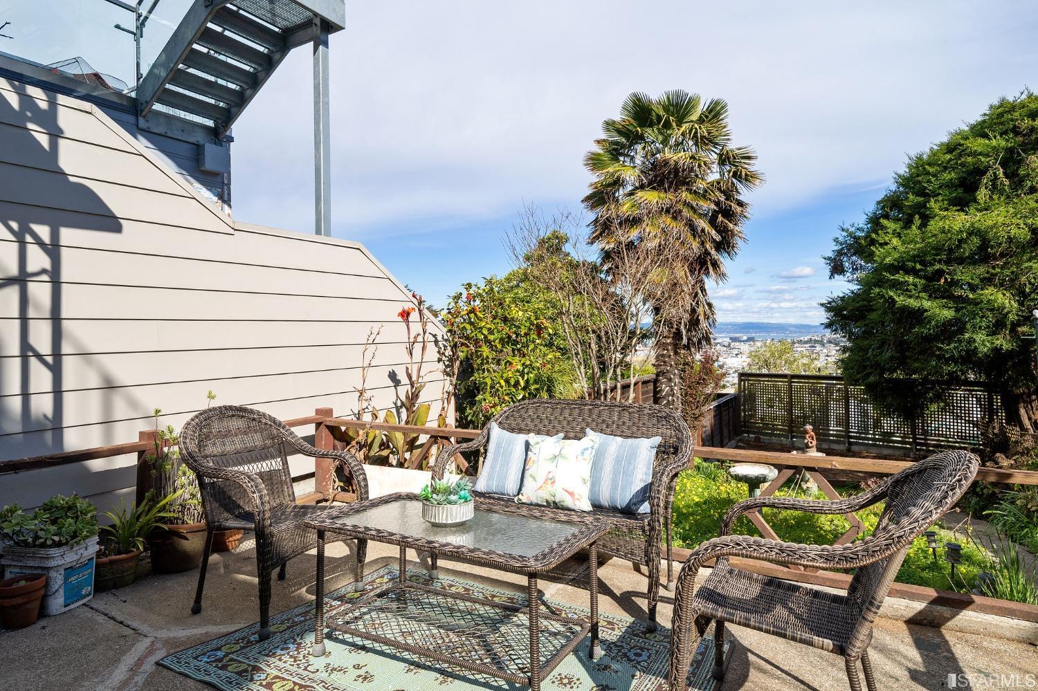 385 Corbett Avenue San Francisco, CA 94114 - Photo 56 of 72 a view of a chairs and table in patio