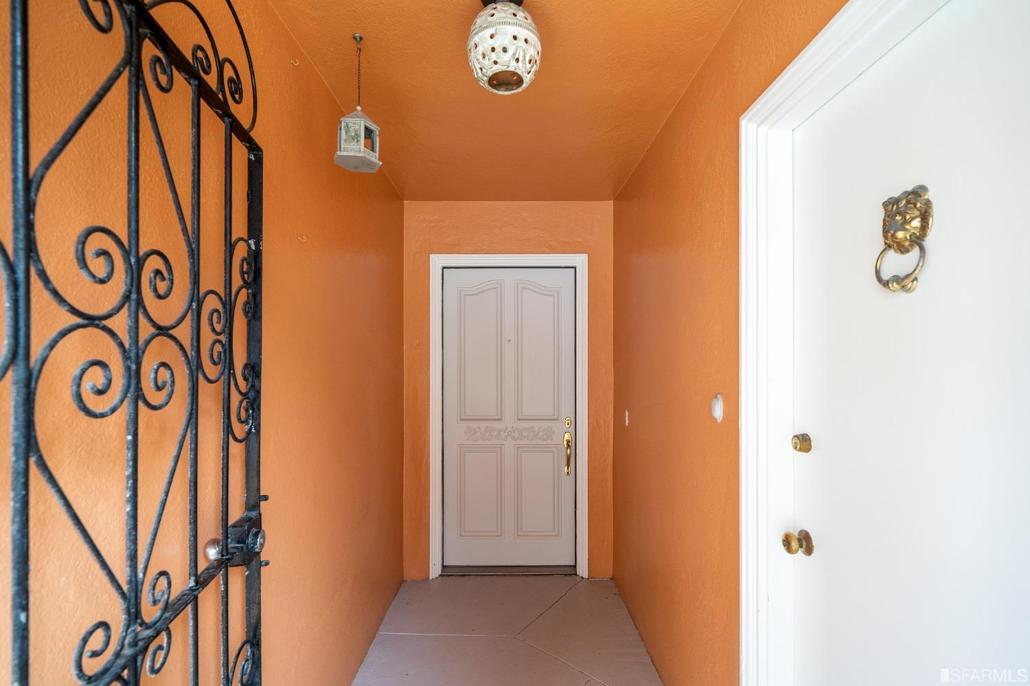 385 Corbett Avenue San Francisco, CA 94114 - Photo 8 of 72 a door with a tree in front of it