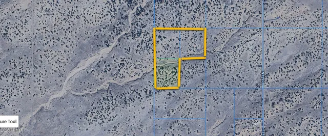 a sign that is sitting on a rock