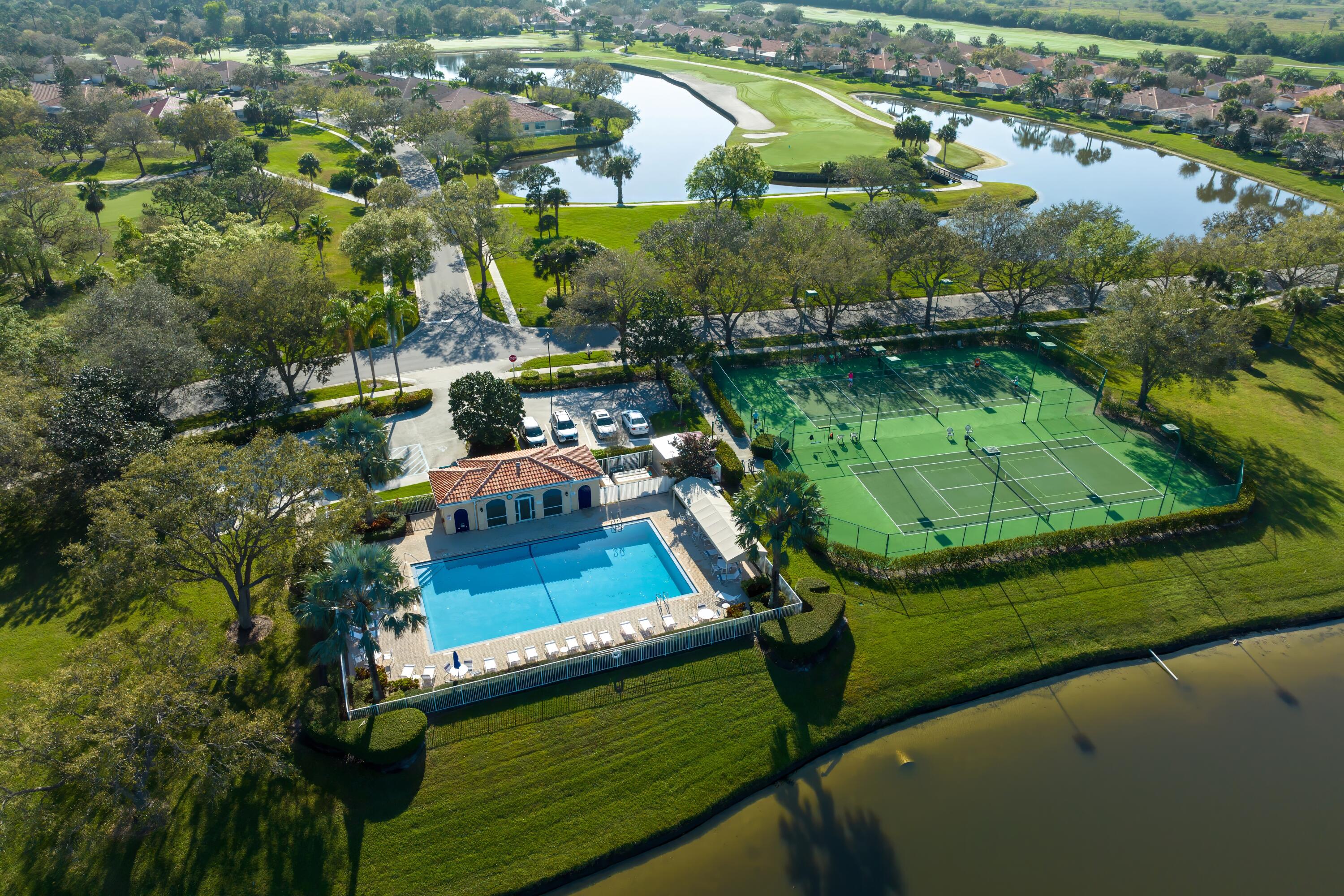 1134 Southwest Balmoral Trace Stuart, FL 34997 - Photo 30 of 33 Community pool and Pickleball