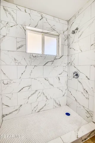 a view of an empty room with window