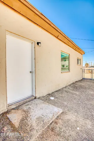 a stove top oven sitting inside of a kitchen
