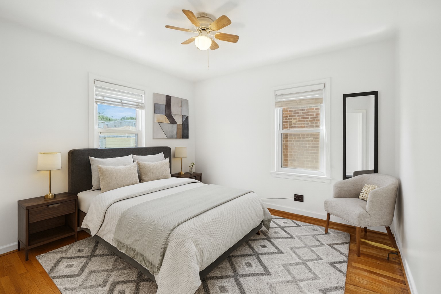 4631 North Lawler Avenue Chicago, IL 60630 - Photo 14 of 34 a bedroom with a bed and a couch