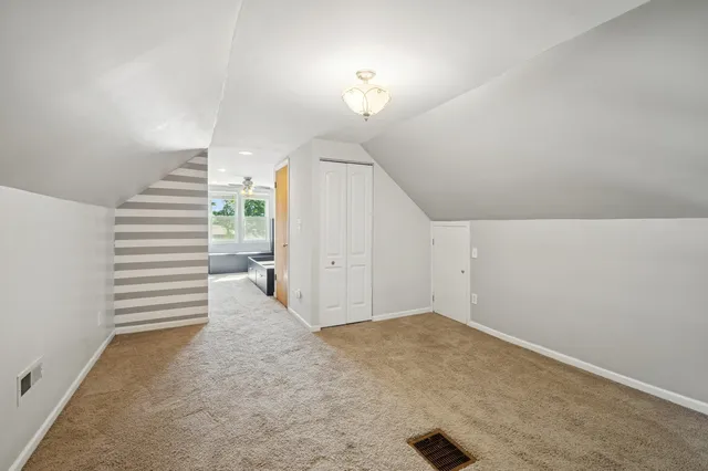 a view of a livingroom with a staircase