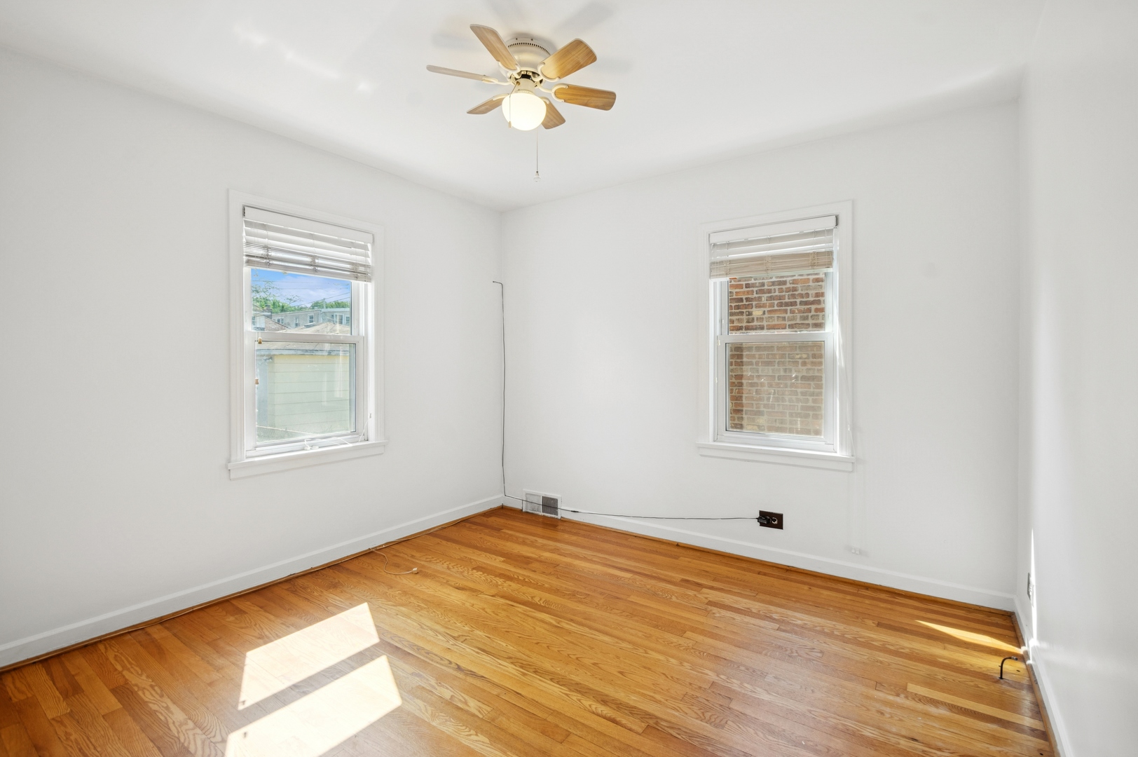 4631 North Lawler Avenue Chicago, IL 60630 - Photo 15 of 34 a view of an empty room with a window