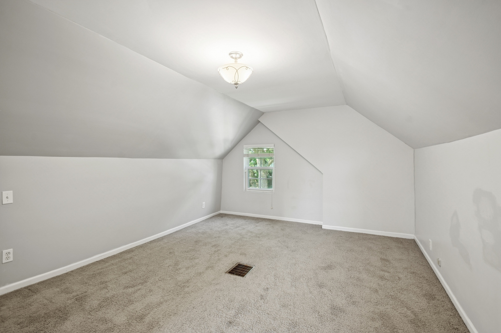4631 North Lawler Avenue Chicago, IL 60630 - Photo 18 of 34 an empty room with a chandelier fan and windows