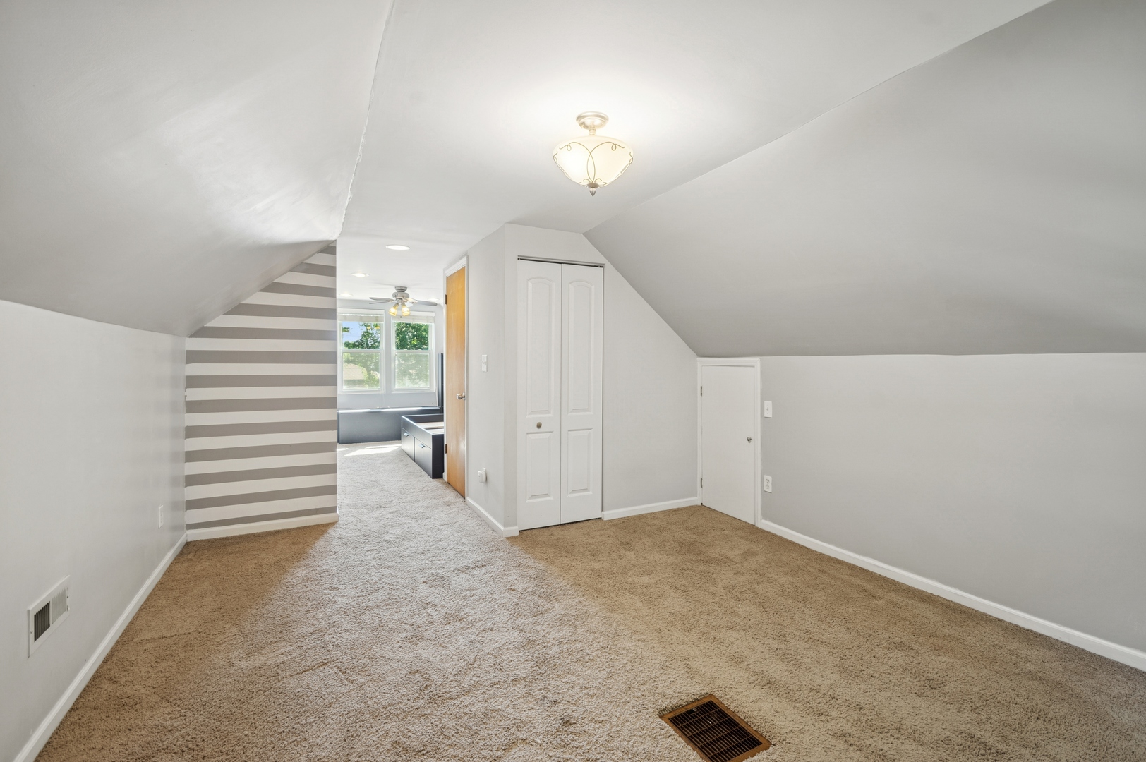 4631 North Lawler Avenue Chicago, IL 60630 - Photo 19 of 34 a view of a livingroom with a staircase