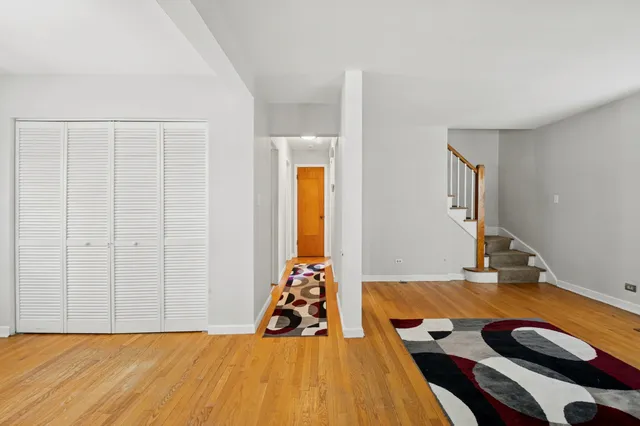 a bed room with a bed and a window