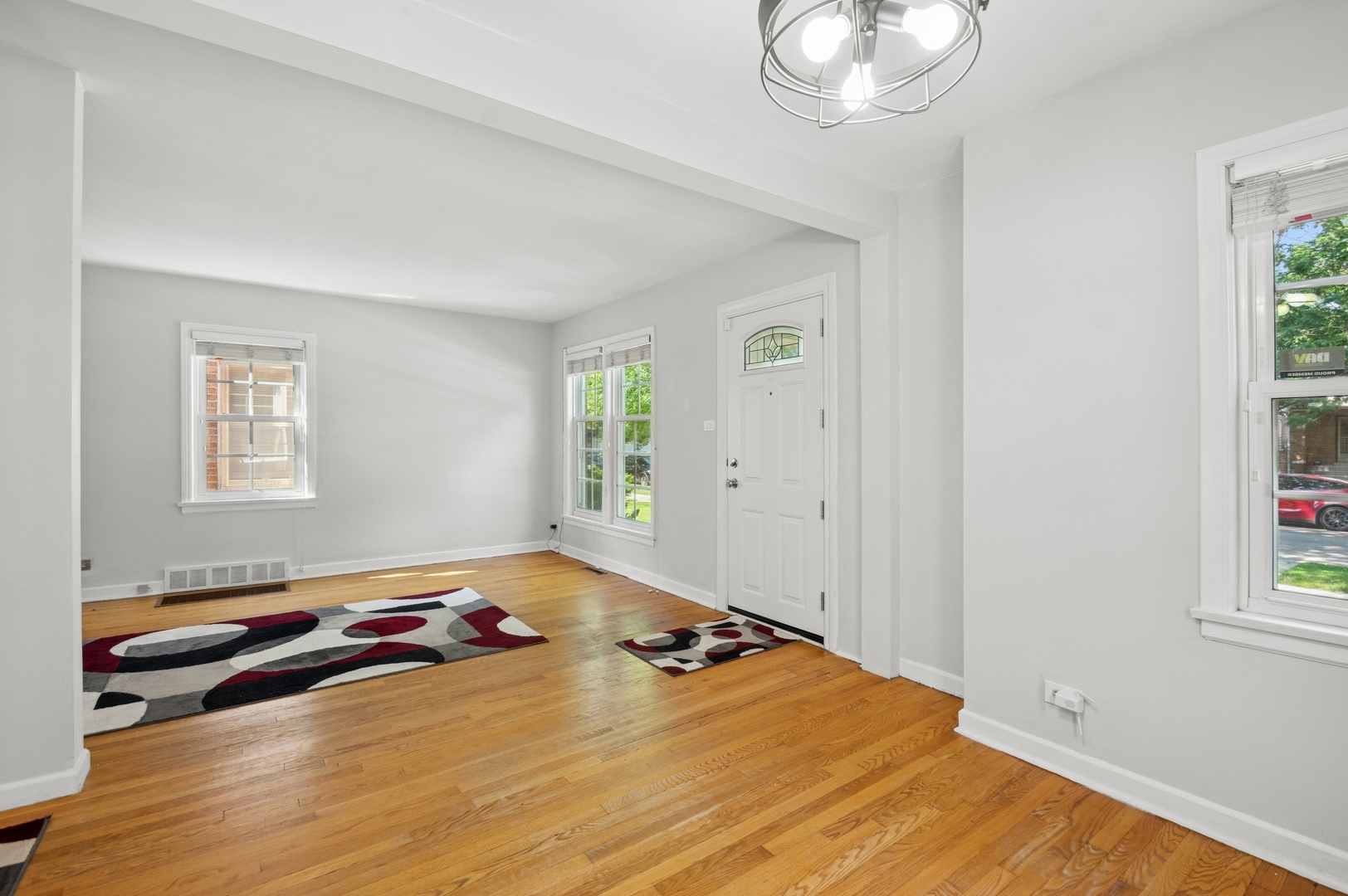 4631 North Lawler Avenue Chicago, IL 60630 - Photo 10 of 34 a room with a bed and a window