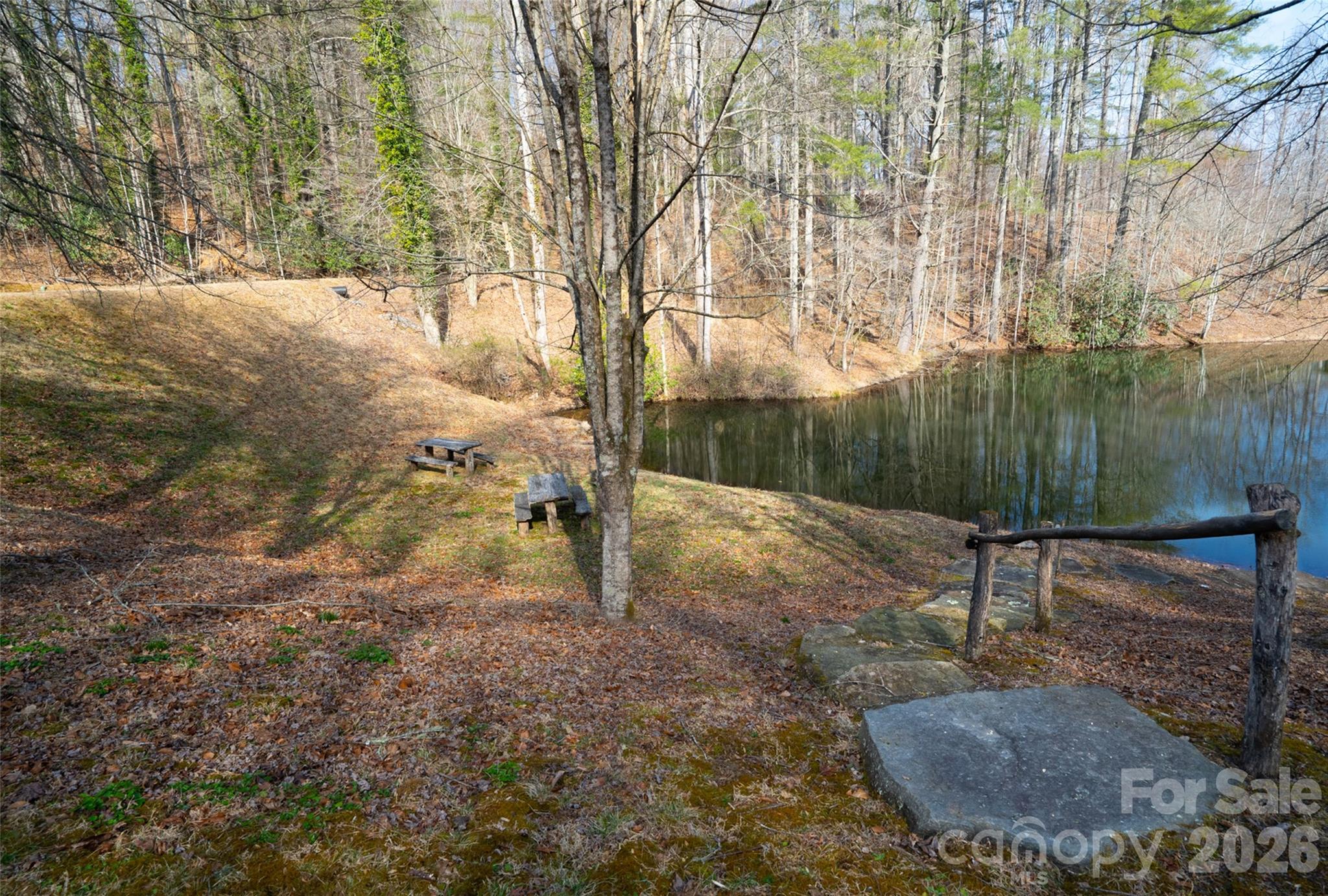 29 Open Ridge Trail Pisgah Forest, NC 28768 - Photo 14 of 16 a backyard of a house with lots of green space