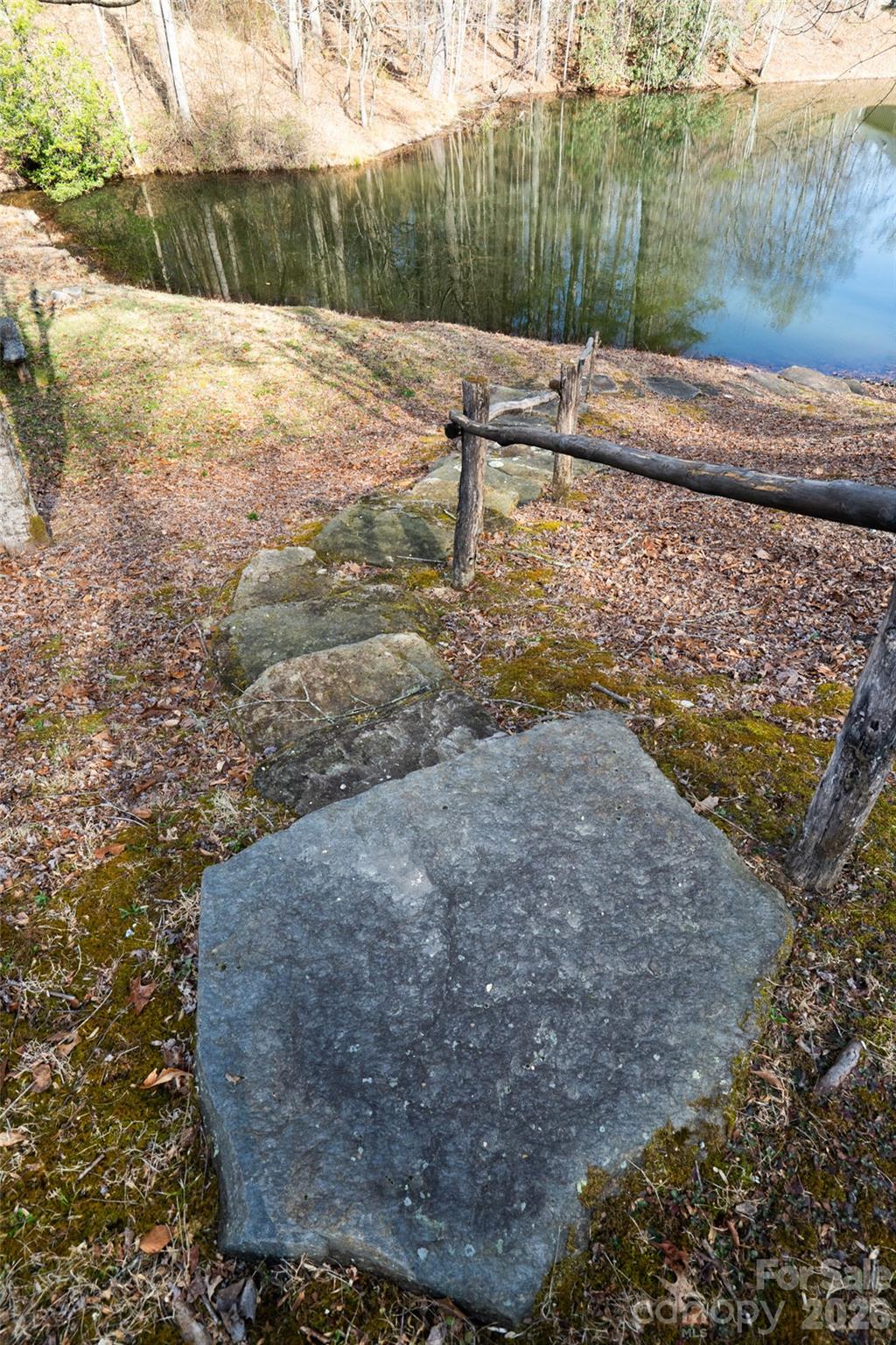 29 Open Ridge Trail Pisgah Forest, NC 28768 - Photo 15 of 16 a view of a lake with a yard