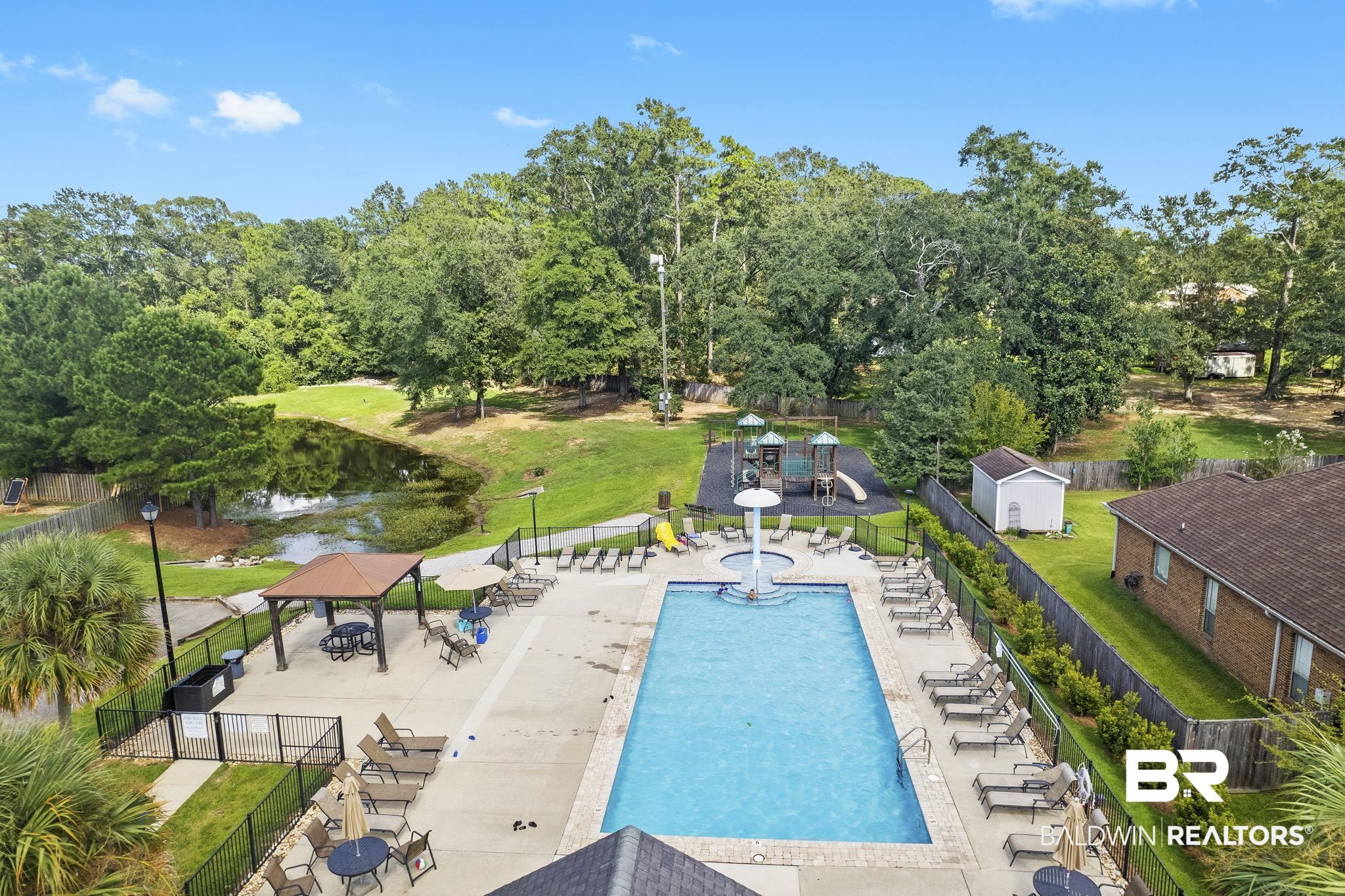 11247 Thistledown Loop Spanish Fort, AL 36527 - Photo 57 of 72 Pool featuring a yard, a patio area, fence, and a gazebo