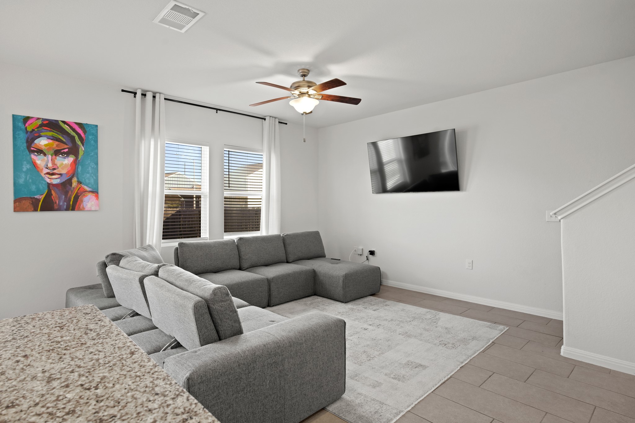 13005 Foreston Drive Austin, TX 78754 - Photo 5 of 36 a living room with furniture and a flat screen tv