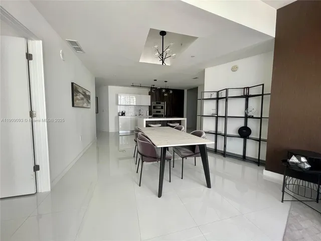 a view of kitchen and sink