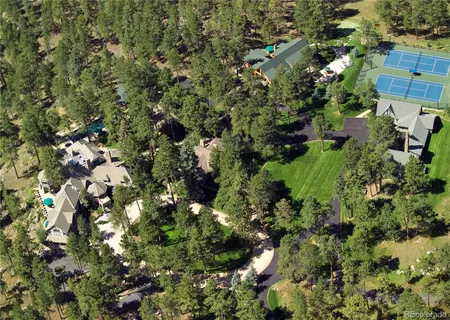 a view of a house with a tree