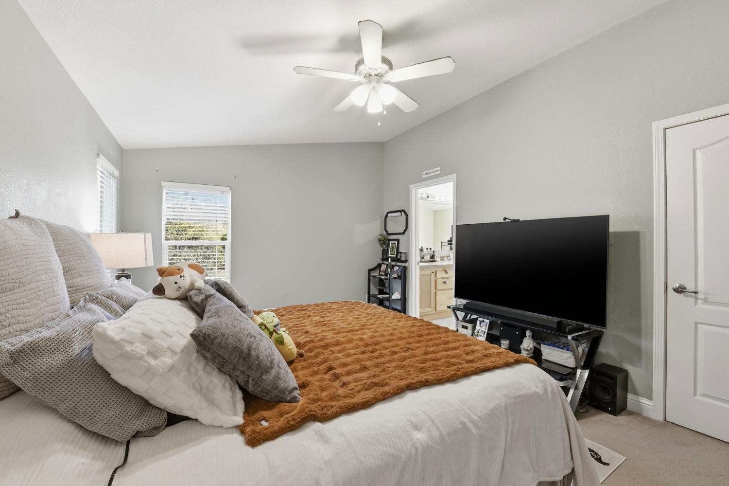 1160 Pleasant Valley Road Diamond Springs, CA 95619 - Photo 15 of 42 a bedroom with a bed and a flat screen tv