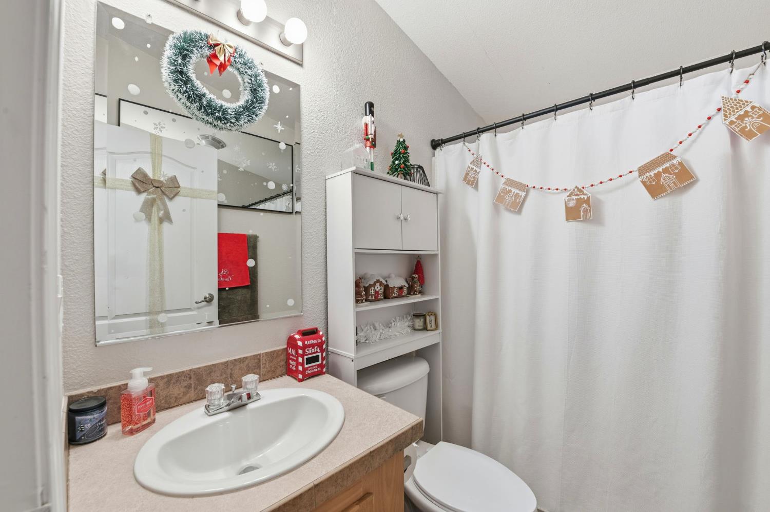 1160 Pleasant Valley Road Diamond Springs, CA 95619 - Photo 22 of 42 a bathroom with a sink toilet and shower