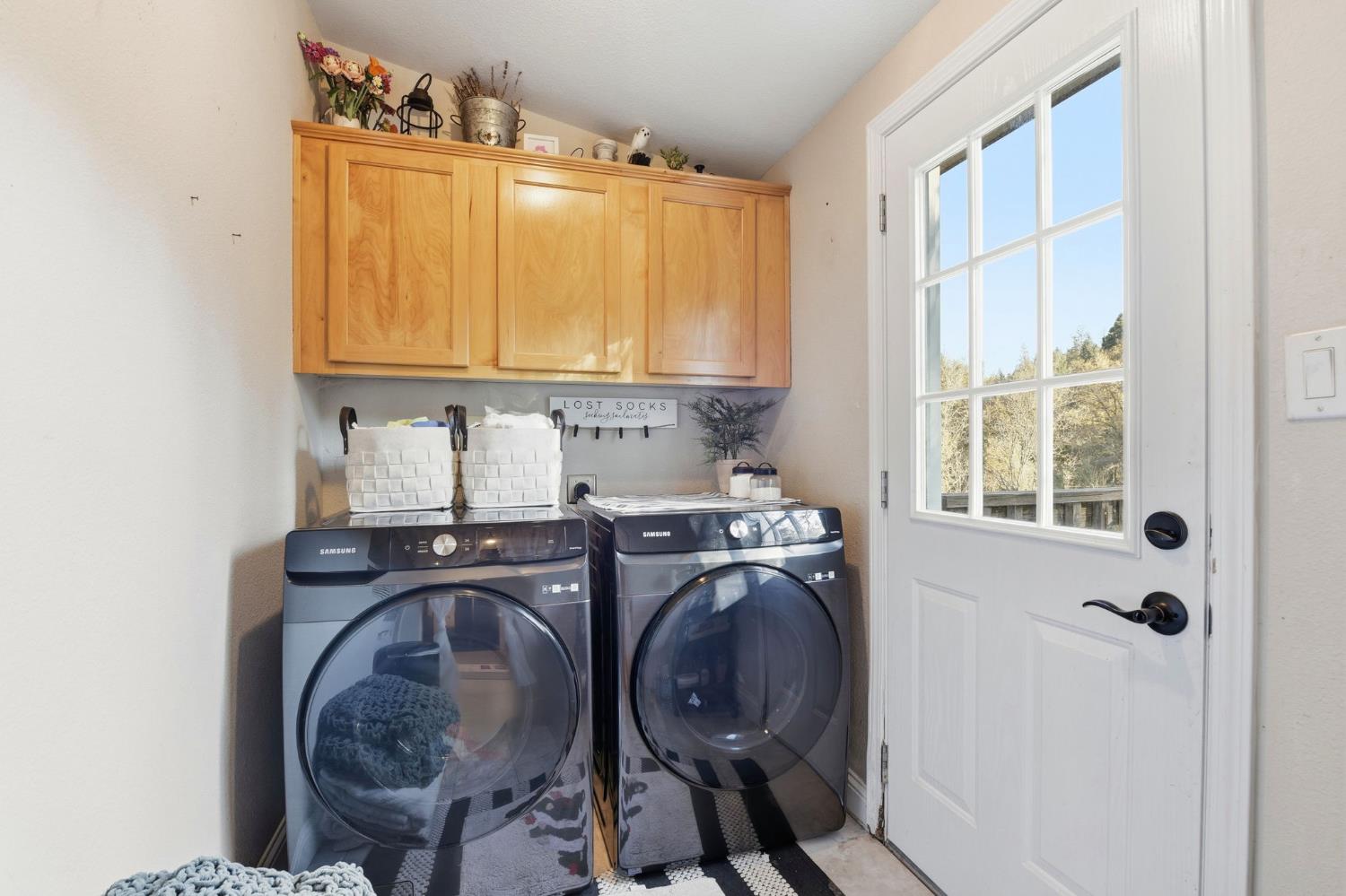 1160 Pleasant Valley Road Diamond Springs, CA 95619 - Photo 23 of 42 a utility room with closet dryer and washer