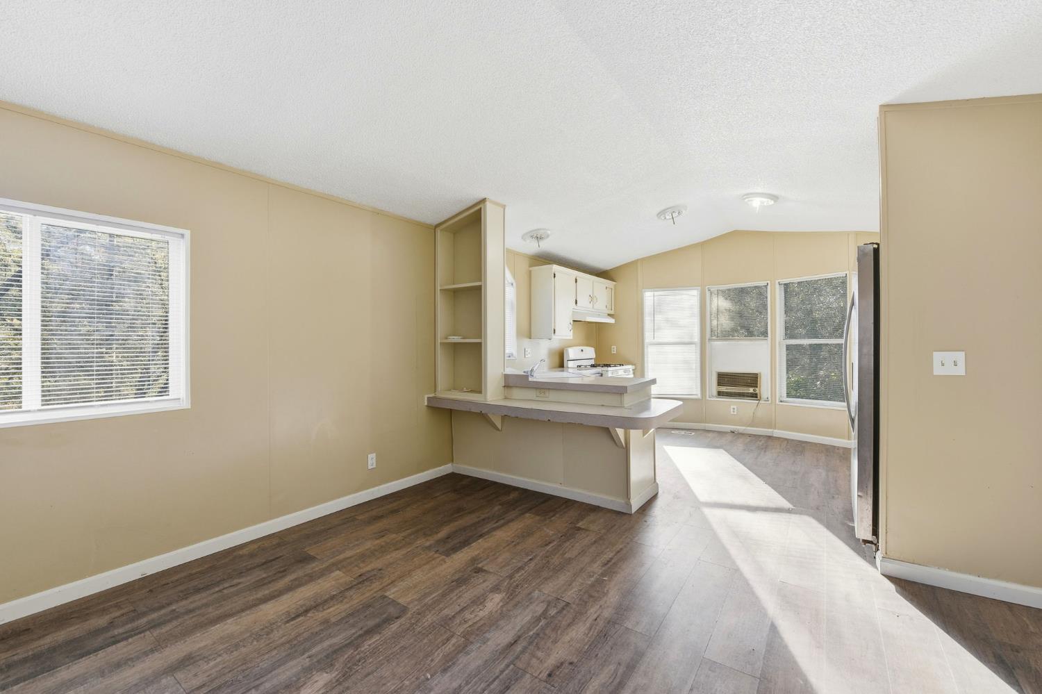 1160 Pleasant Valley Road Diamond Springs, CA 95619 - Photo 28 of 42 a large white kitchen with a large window