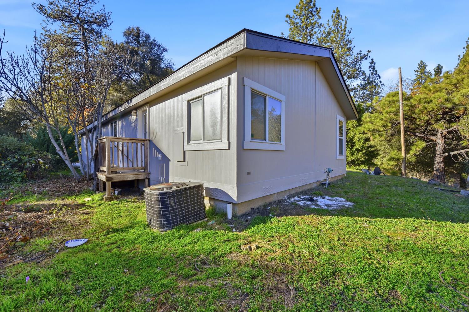 1160 Pleasant Valley Road Diamond Springs, CA 95619 - Photo 40 of 42 a front view of a house with garden
